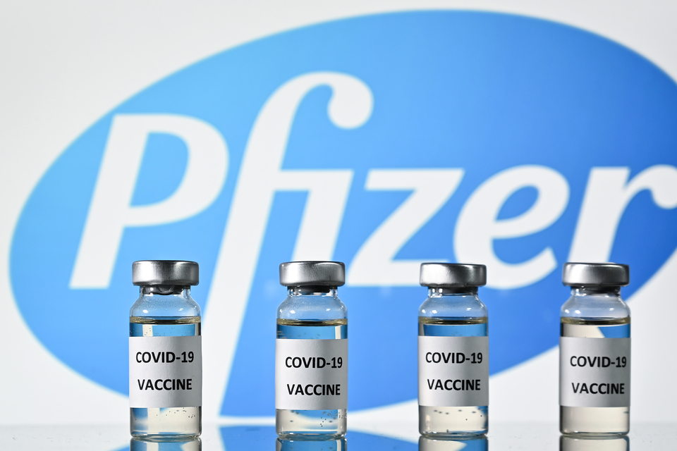 (FILES) In this file photo taken on November 17, 2020 (FILES) This file photo illustration picture shows vials with Covid-19 Vaccine stickers attached, with the logo of US pharmaceutical company Pfizer, on November 17, 2020. - Britain on December 2, 2020 became the first country to approve Pfizer-BioNTech's Covid-19 vaccine for general use and said it would be introduced next week. (Photo by JUSTIN TALLIS / AFP)